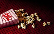 Screen 9 text, on a dark red background, with popcorn scattered around.
