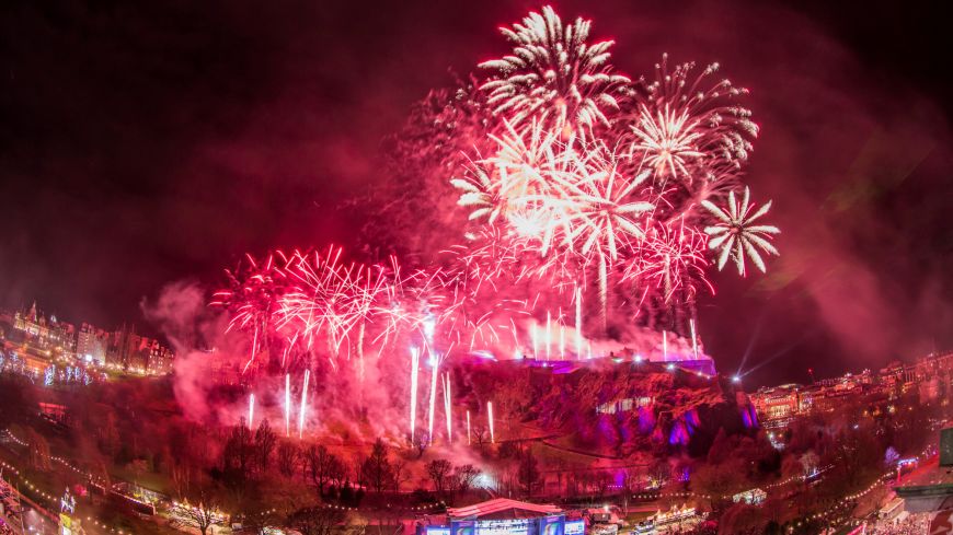 Midnight fireworks at Edinburgh's Hogmanay (wide)